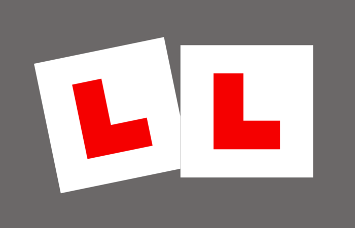Learner L signs